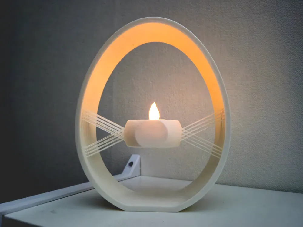 3D gedruckter eiförmiger LED-Teelichthalter als Osterdekoration, schwebend. Perfekte Dekoration für Ostern.